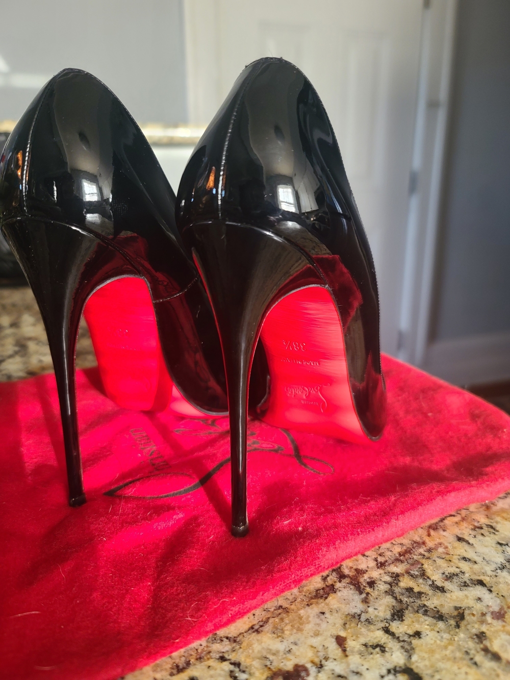 Christian Louboutin Black Patent Stiletto Pumps with Red Soles